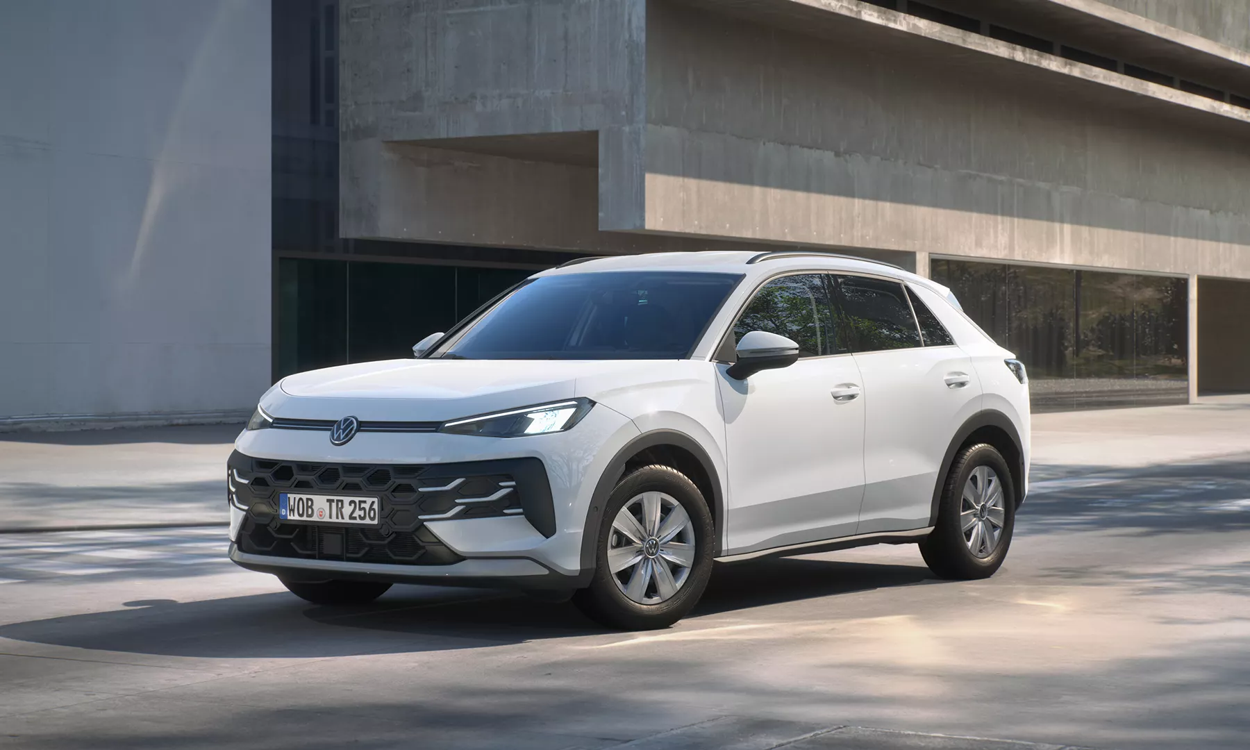 tc1354_white-t-roc_parking_in_front_of_building
